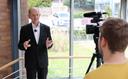 Kammerpräsident Dr. Miller steht für ein Interview vor der Kamera